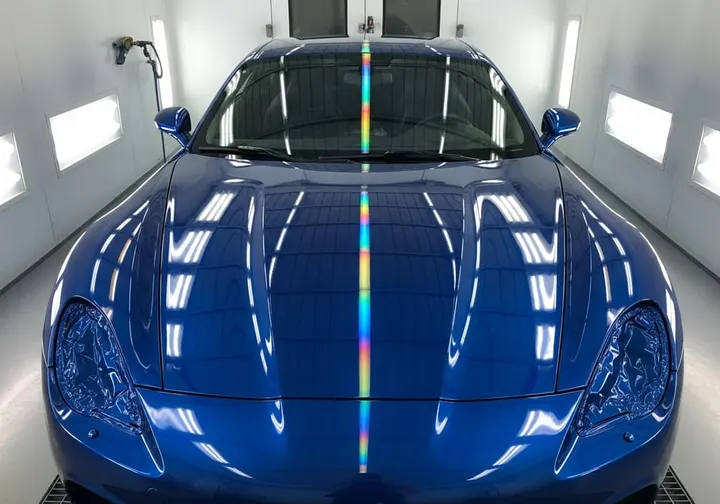 Vehicle mid-repair in a body and paint shop